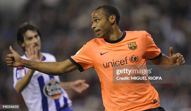 Barcelona's French forward Thierry Henry gives the thumb up during a Spanish first league football match against Deportivo Coruna at the Riazor...