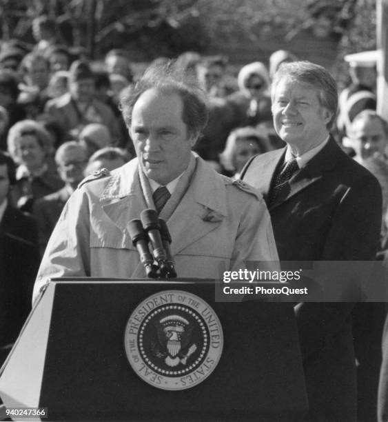 Canadian Prime Minister Pierre Trudeau , with US President Jimmy Carter beside him, speaks at an arrival ceremony on the White House lawn, Washington...