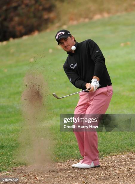 Graeme McDowell of Northern Ireland hits out of the rough on the 16th hole during the third round of the Chevron World Challenge at Sherwood Country...