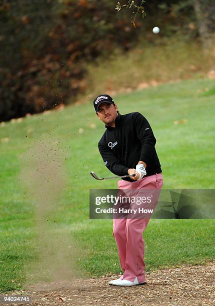 Graeme McDowell of Northern Ireland hits out of the rough on the 16th hole during the third round of the Chevron World Challenge at Sherwood Country...
