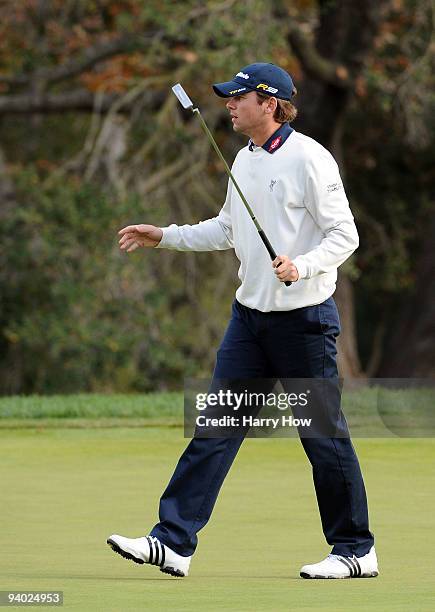 Sean O'Hair reacts to his birdie putt on the 18th hole during the third round of the Chevron World Challenge at Sherwood Country Club on December 5,...