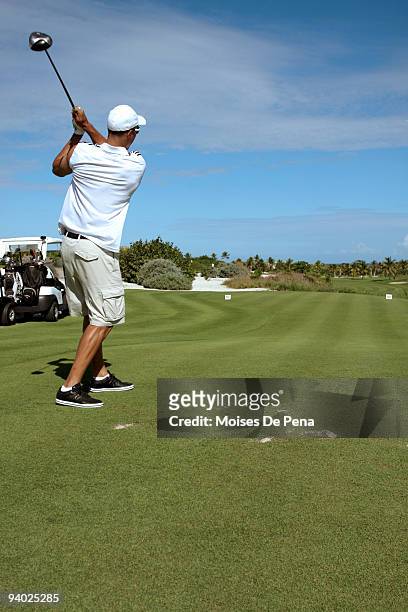 Ubaldo Jimenez plays golf during the David Ortiz Celebrity Golf Classic Golf Tournament on December 5, 2009 in Cap Cana, Dominican Republic.