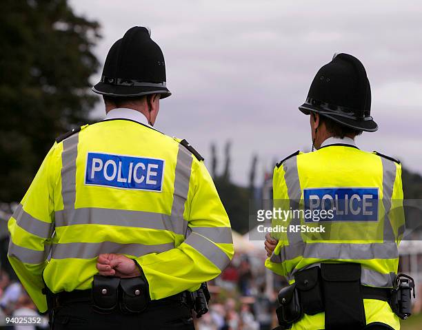 police men at summer fair showground - police stock pictures, royalty-free photos & images
