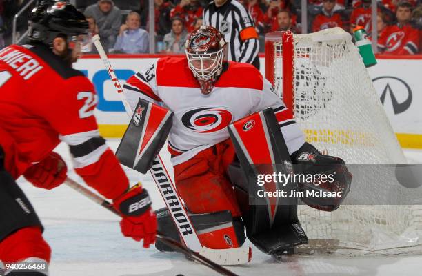 Scott Darling of the Carolina Hurricanes in action against the New Jersey Devils on March 27, 2018 at Prudential Center in Newark, New Jersey. The...