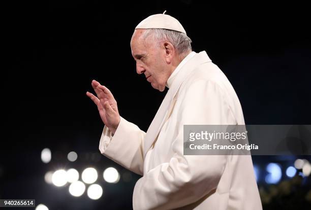 Pope Francis attends the Stations of the Cross at the Colosseum on March 30, 2018 in Rome, Italy.