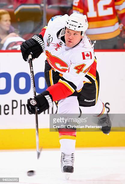 Aaron Johnson of the Calgary Flames warms up before the NHL game against the Phoenix Coyotes at Jobing.com Arena on December 3, 2009 in Glendale,...