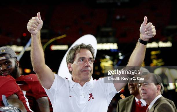 Head coach Nick Saban of the Alabama Crimson Tide celebrates after their 32-13 win over the Florida Gators in the SEC Championship at Georgia Dome on...