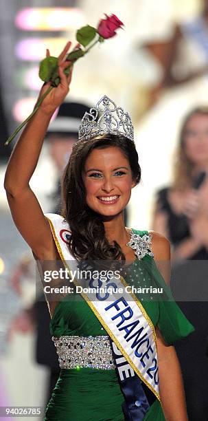 Miss Normandie Malika Menard waves after winning the 2010 Miss France Beauty pageant at the Palais Nikaia on December 5, 2009 in Nice, France.