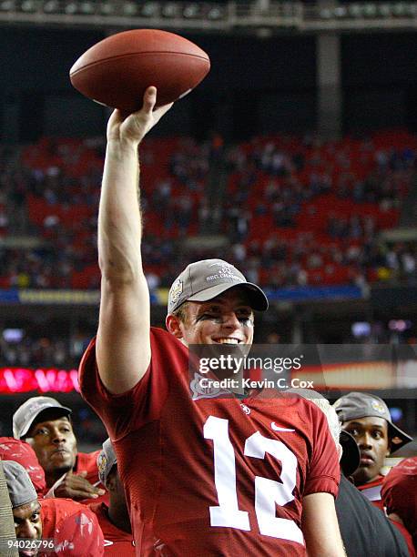 Quarterback Greg McElroy of the Alabama Crimson Tide celebrates after their 32-13 win over the Florida Gators in the SEC Championship at Georgia Dome...