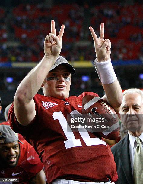 Quarterback Greg McElroy of the Alabama Crimson Tide celebrates after their 32-13 win over the Florida Gators in the SEC Championship at Georgia Dome...