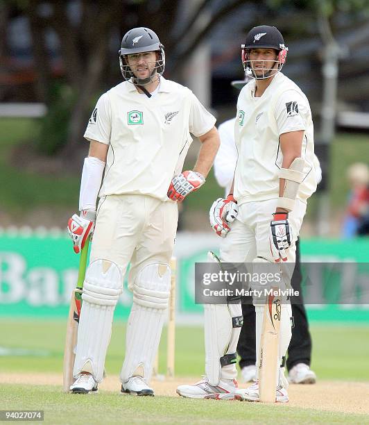 Daniel Vettori captain and Daryl Tuffey of New Zealand wait for a player review during the Second Test match between New Zealand and Pakistan at...