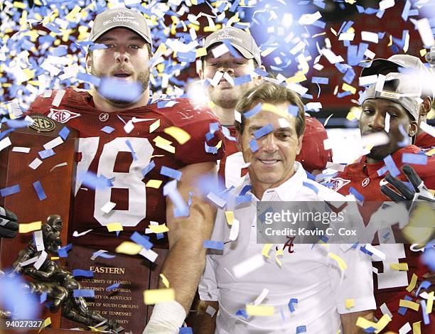 Head coach Nick Saban and Mike Johnson of the Alabama Crimson Tide celebrate after their 32-13 win against the Florida Gators during the SEC...