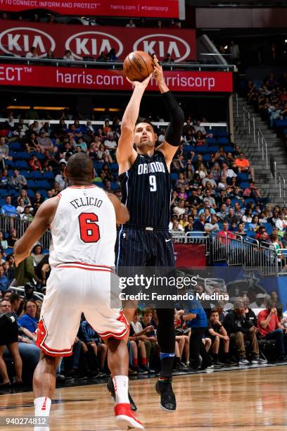 Nikola Vucevic of the Orlando Magic shoots the ball against the Chicago Bulls on March 30, 2018 at Amway Center in Orlando, Florida. NOTE TO USER:...