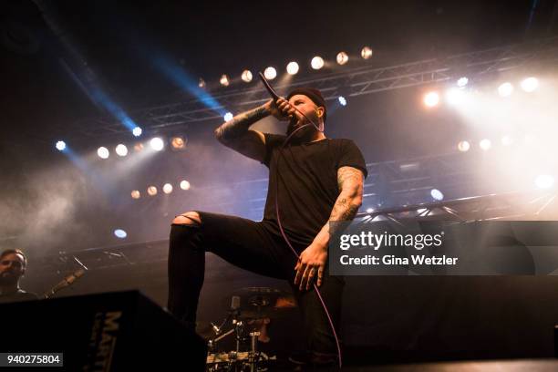 Singer Jake Luhrs of the American band August Burns Red performs live on stage in support of the German band Heaven Shall Burn during a concert at...