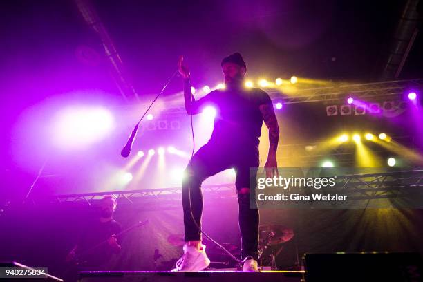 Singer Jake Luhrs of the American band August Burns Red performs live on stage in support of the German band Heaven Shall Burn during a concert at...