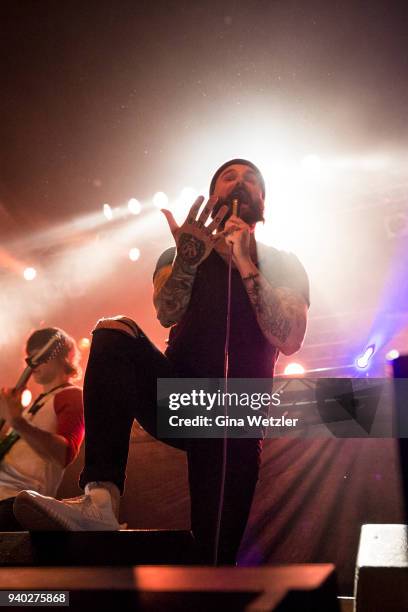 Singer Jake Luhrs of the American band August Burns Red performs live on stage in support of the German band Heaven Shall Burn during a concert at...