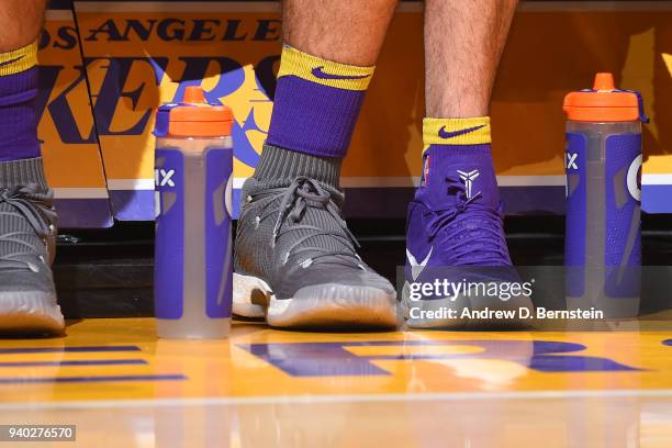 The sneakers worn by Ivica Zubac and Julius Randle of the Los Angeles Lakers are seen during the game against the Dallas Mavericks on March 28, 2018...