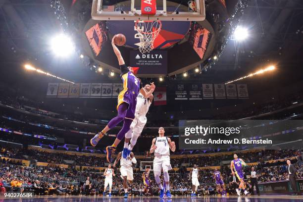 Lonzo Ball of the Los Angeles Lakers dunks the ball during the game against the Dallas Mavericks on March 28, 2018 at STAPLES Center in Los Angeles,...