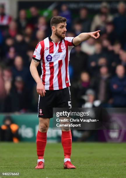 Lincoln City's Luke Waterfall during the Sky Bet League Two match between Lincoln City and Exeter City at Sincil Bank Stadium on March 30, 2018 in...