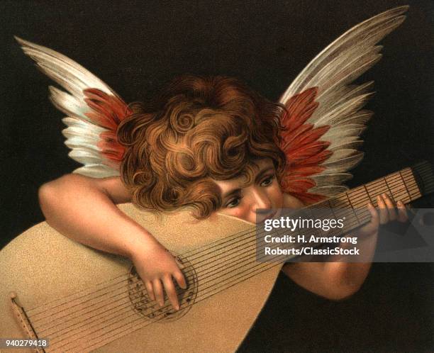 1520s 1521 CHERUB PLAYING THE LUTE PAINTING BY FIORENTINO NOW AT THE UFFIZI FLORENCE ITALY