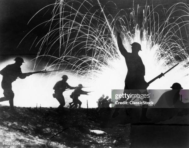 1910s 1918 WORLD WAR I ANONYMOUS SILHOUETTED AMERICAN EXPEDITIONARY FORCE SOLDIERS WITH FIXED BAYONETS CHARGING IN NIGHT BATTLE