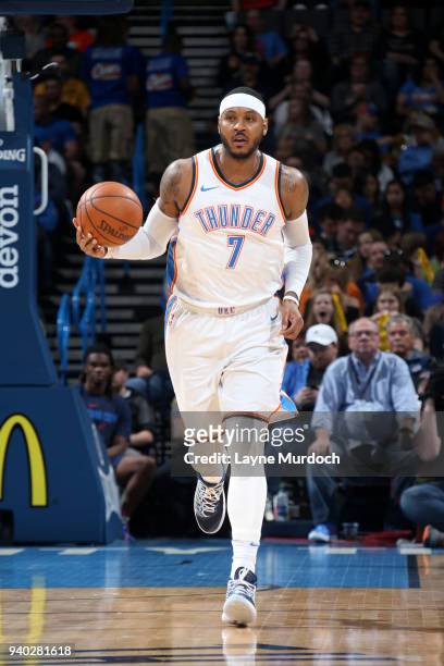 Carmelo Anthony of the Oklahoma City Thunder handles the ball against the Denver Nuggets on March 30, 2018 at Chesapeake Energy Arena in Oklahoma...