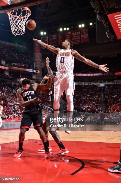 Marquese Chriss of the Phoenix Suns grabs the rebound against the Houston Rockets on March 30, 2018 at the Toyota Center in Houston, Texas. NOTE TO...