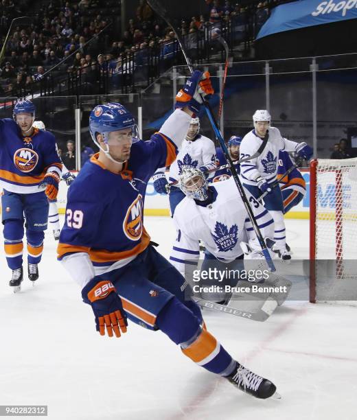 Brock Nelson of the New York Islanders scores at 10:45 of the second period against Frederik Andersen of the Toronto Maple Leafs at the Barclays...