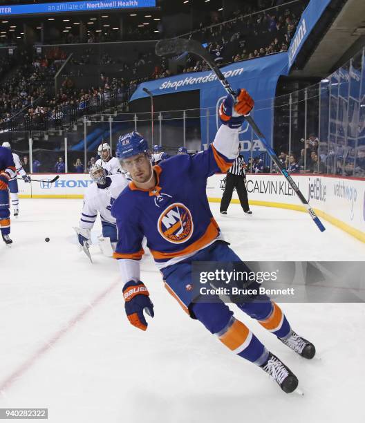 Brock Nelson of the New York Islanders scores at 10:45 of the second period against Frederik Andersen of the Toronto Maple Leafs at the Barclays...