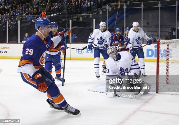 Brock Nelson of the New York Islanders scores at 10:45 of the second period against Frederik Andersen of the Toronto Maple Leafs at the Barclays...