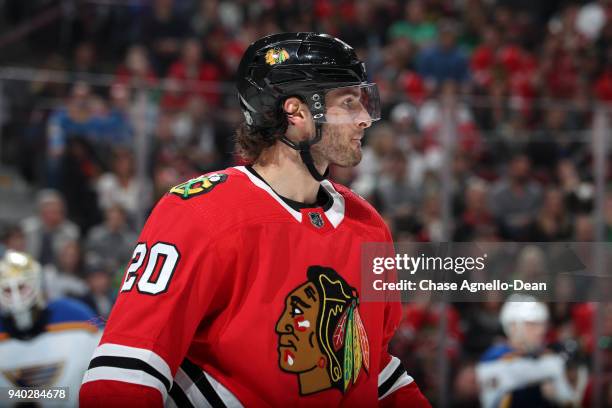 Brandon Saad of the Chicago Blackhawks looks across the ice in the second period against the St. Louis Blues at the United Center on March 18, 2018...