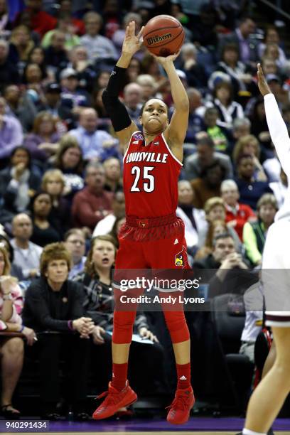 Asia Durr of the Louisville Cardinals attempts a jump shot against the Mississippi State Lady Bulldogs during the second half in the semifinals of...