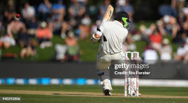 New Zealand batsman BJ Watling losses part of his helmet after being hit by a ball from Mark Wood during day two of the Second Test Match between the...