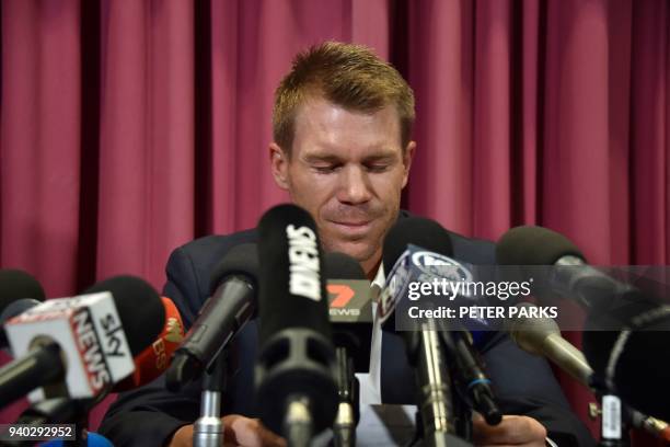Australian cricketer David Warner speaks at a press conference at the Sydney Cricket Ground in Sydney on March 31 after returning from South Africa....