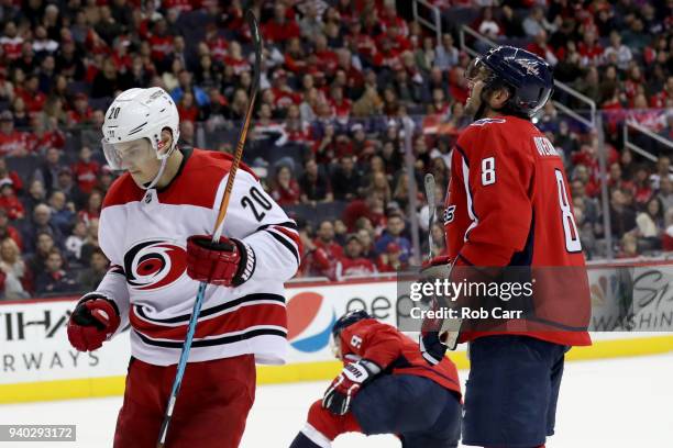 Sebastian Aho of the Carolina Hurricanes celebrates in front of Alex Ovechkin of the Washington Capitals after scoring a third period goal at Capital...