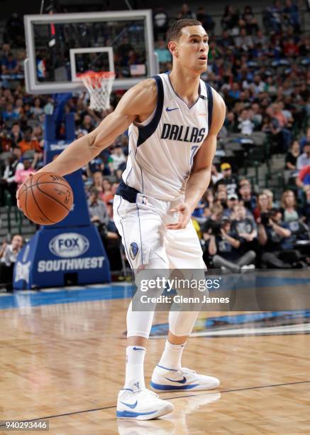Dwight Powell of the Dallas Mavericks handles the ball against the Minnesota Timberwolves on March 30, 2018 at the American Airlines Center in...