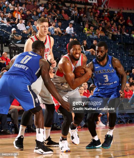 Hidalgo, TX Darius Morris of the Rio Grande Valley Vipers tries to get past Jameel Warney and Damon Lynn of the Texas Legends during Round One of the...