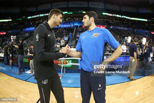 Juan Hernangomez of the Denver Nuggets and Alex Abrines of the Oklahoma City Thunder talk before the game on March 30, 2018 at Chesapeake Energy...
