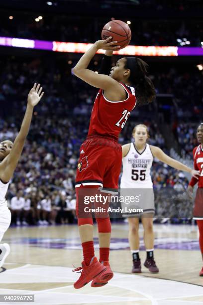 Asia Durr of the Louisville Cardinals attempts a jump shot against the Mississippi State Lady Bulldogs during the second half in the semifinals of...