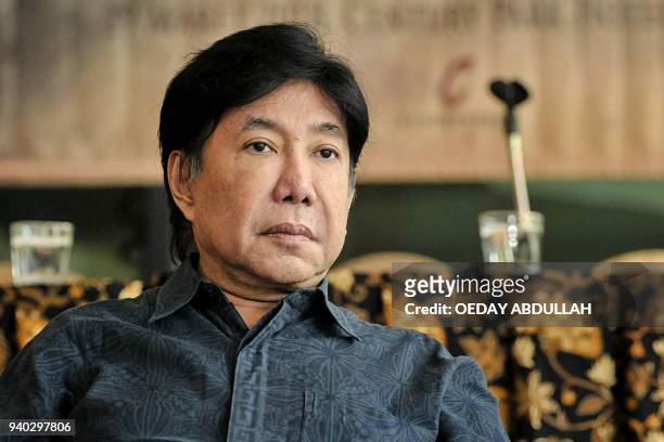 This picture taken on March 30, 2018 shows Indonesian artist Muhammad Guruh Irianto Sukarnoputra posing during a promotional event in Jakarta....