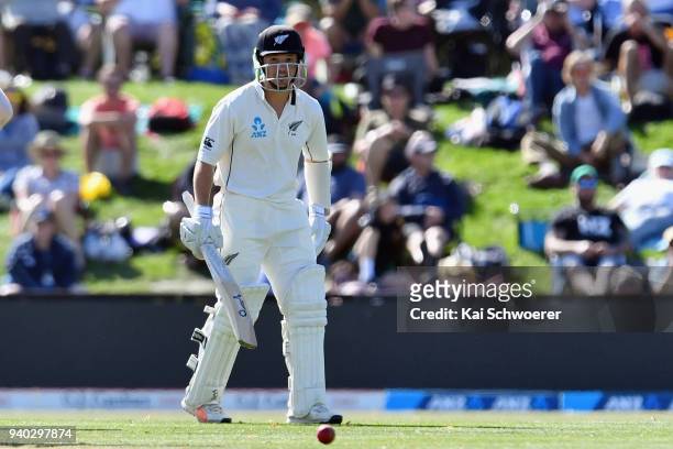 Watling of New Zealand looks on after being hit by a ball during day two of the Second Test match between New Zealand and England at Hagley Oval on...