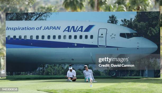 Meghan Kang of the United States and Madelene Sagstrom of Sweden wait to play her tee shot on the par 3, 17th hole during the second round of the...