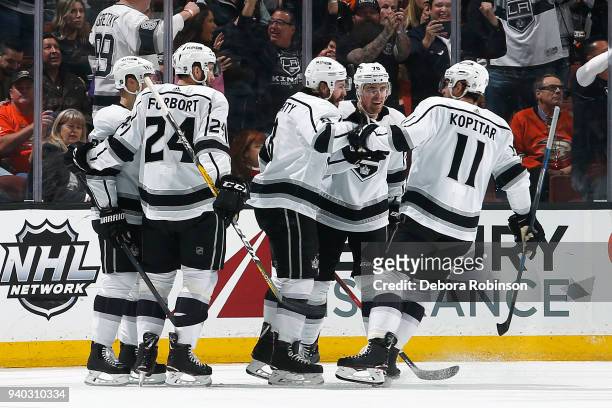 Tanner Pearson, Drew Doughty, Derek Forbort, Anze Kopitar of the Los Angeles Kings celebrate Doughty's goal in the first period of the game against...