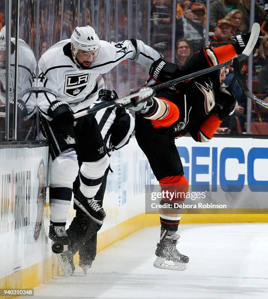 Nate Thompson of the Los Angeles Kings battles against Rickard Rakell of the Anaheim Ducks during the game on March 30, 2018 at Honda Center in...