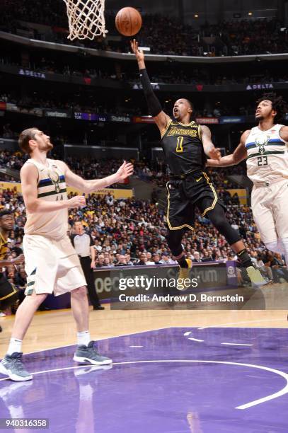 Kentavious Caldwell-Pope of the Los Angeles Lakers shoots the ball during the game against the Milwaukee Bucks on March 30, 2018 at STAPLES Center in...