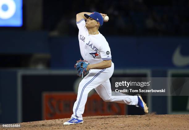 Roberto Osuna of the Toronto Blue Jays delivers a pitch in the ninth inning during MLB game action against the New York Yankees at Rogers Centre on...