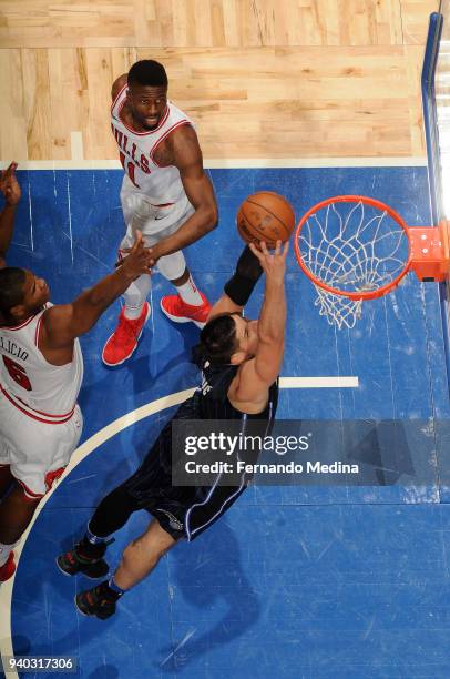 Nikola Vucevic of the Orlando Magic handles the ball against the Chicago Bulls on March 30, 2018 at Amway Center in Orlando, Florida. NOTE TO USER:...