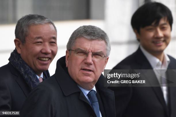 International Olympic Committee President Thomas Bach arrives at Beijing airport, after a flight from North Korea, on March 31, 2018. North Korea's...