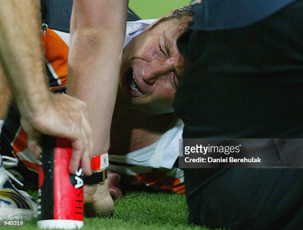 Captian Terry Hill of the Tigers was stretchered off injured during the NRL third round match between the Wests Tigers v the Canberra Raiders played...