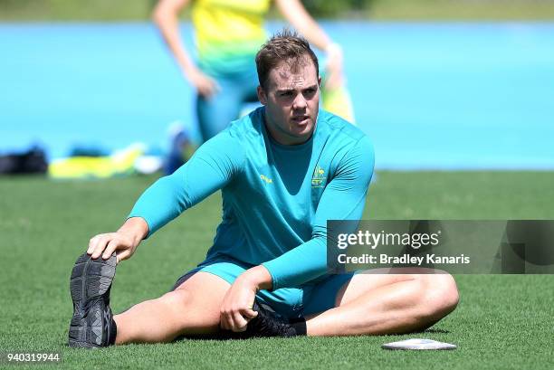 Matthew Denny warms up as the Australian Athletics team continue preparations at Nudgee College Athletics ahead of the 2018 Gold Coast Commonwealth...